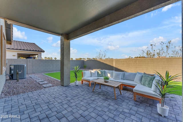 view of patio featuring central AC unit and outdoor lounge area