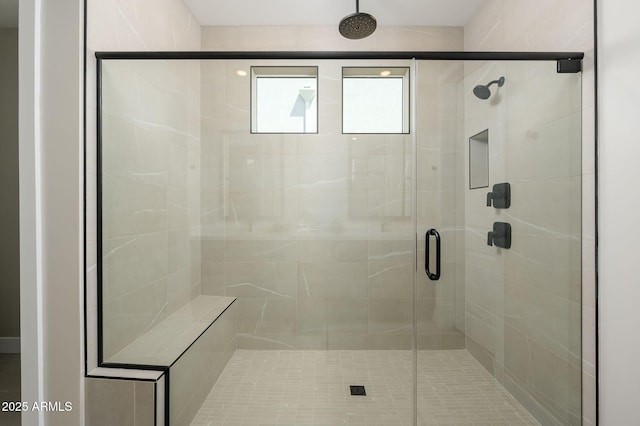 full bathroom featuring a shower stall