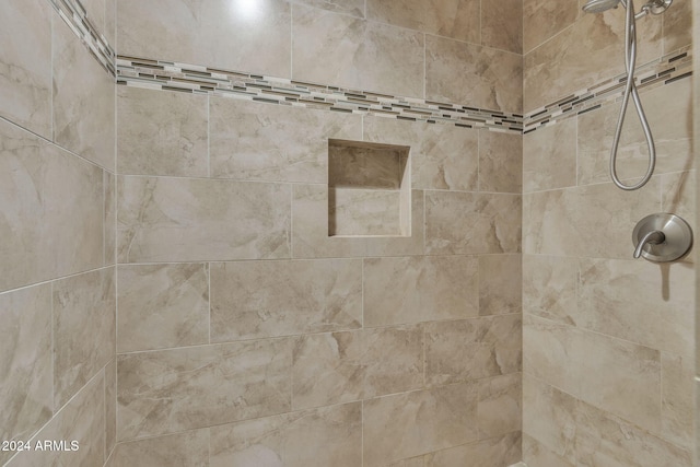 details featuring a tile shower