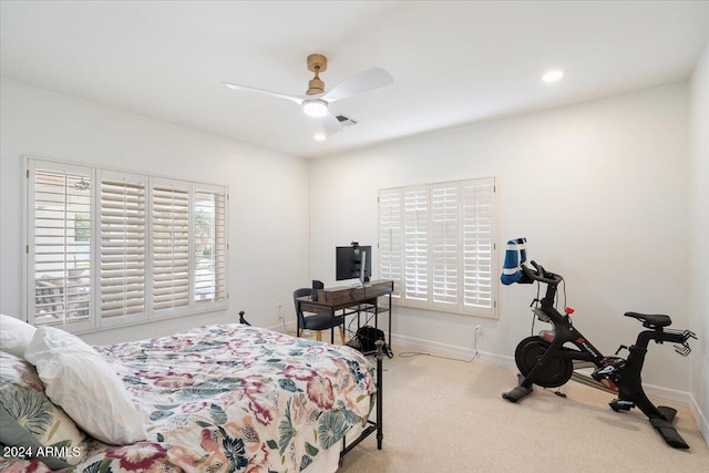 carpeted bedroom with ceiling fan