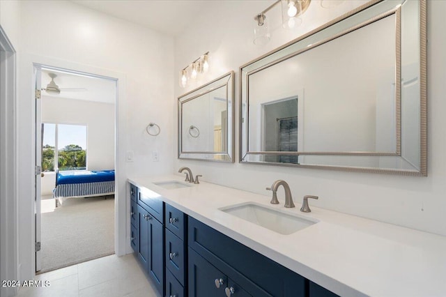 bathroom featuring vanity, ceiling fan, and tile patterned floors