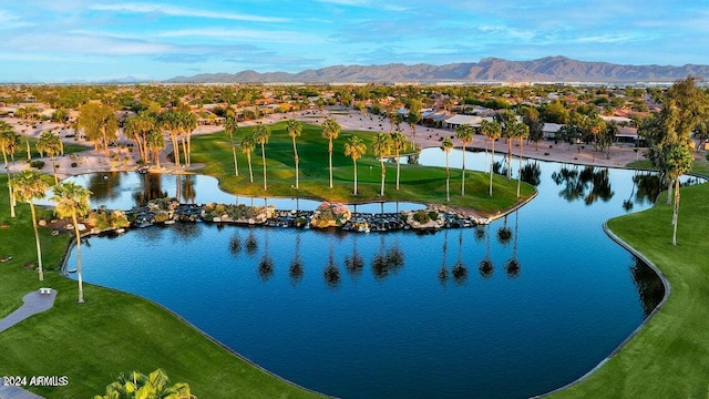 bird's eye view with a water and mountain view