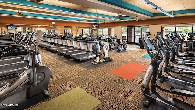 exercise room with carpet flooring