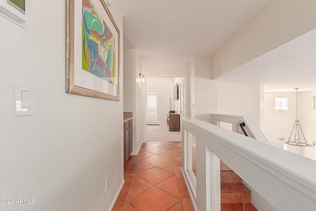 hallway with light tile patterned flooring