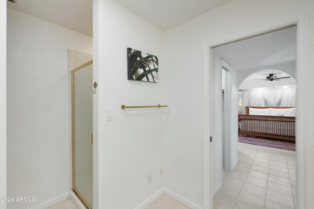 hallway with light tile patterned flooring