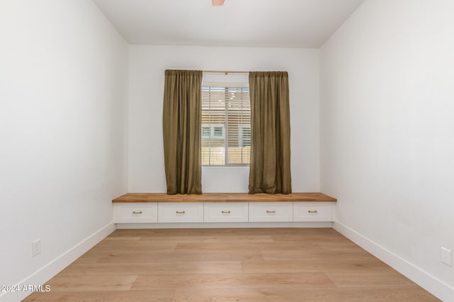 unfurnished room featuring light hardwood / wood-style floors