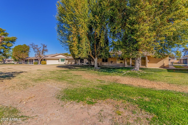 view of yard featuring a garage