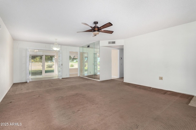 spare room with carpet and ceiling fan