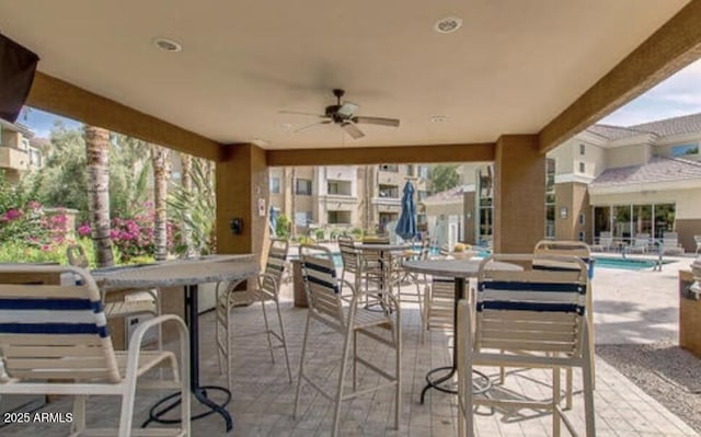 view of patio / terrace with ceiling fan