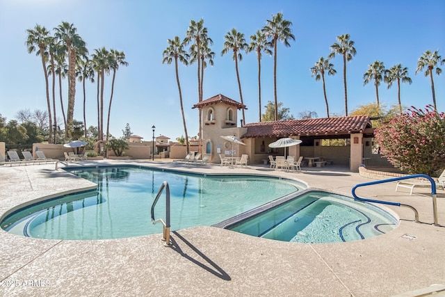 view of pool featuring a patio