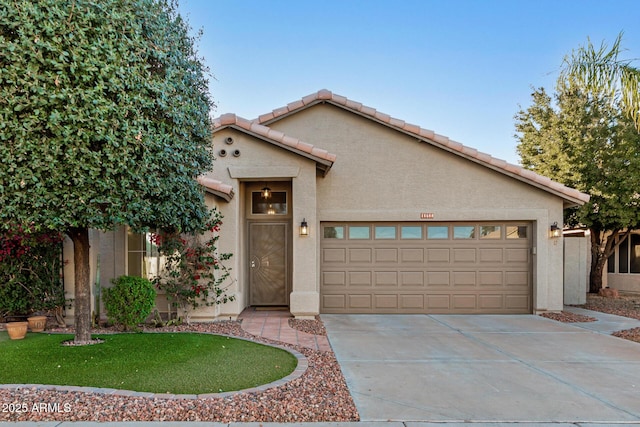 view of front of home with a garage