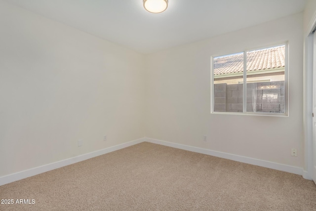 view of carpeted spare room