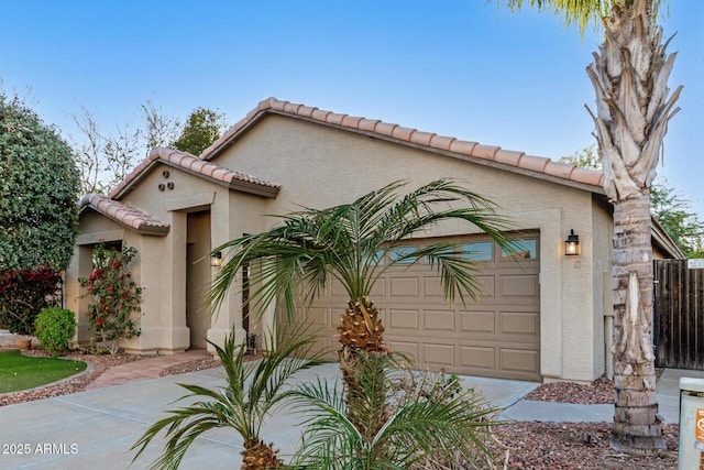 mediterranean / spanish-style house featuring a garage