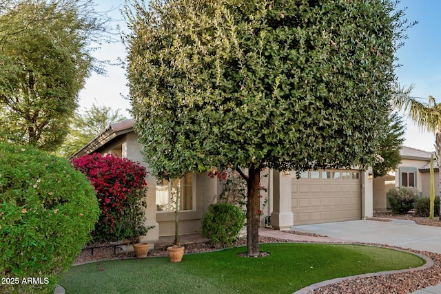 obstructed view of property featuring a garage