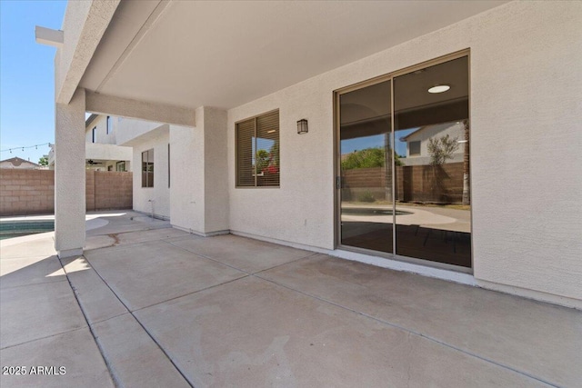 view of patio with fence