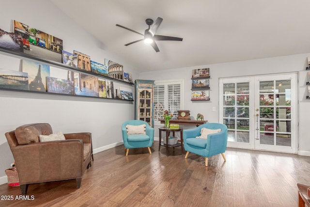 sitting room featuring french doors, baseboards, ceiling fan, and wood finished floors