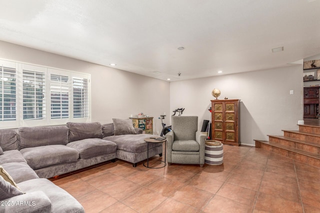 living area featuring recessed lighting, stairway, and light tile patterned flooring