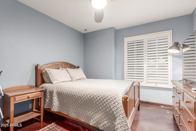 bedroom with baseboards and ceiling fan