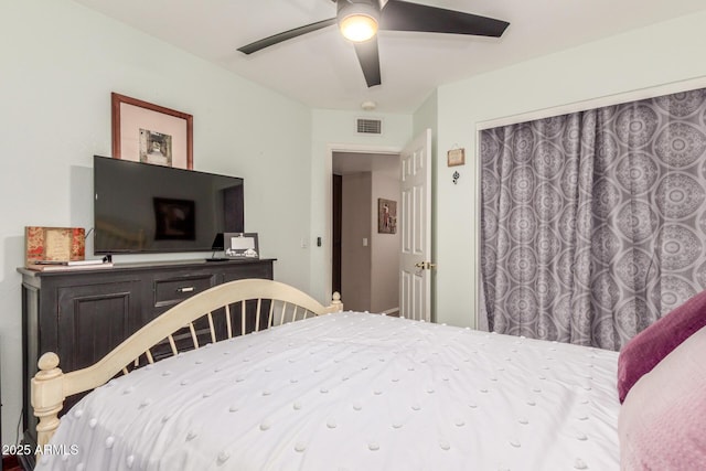 bedroom with visible vents and a ceiling fan