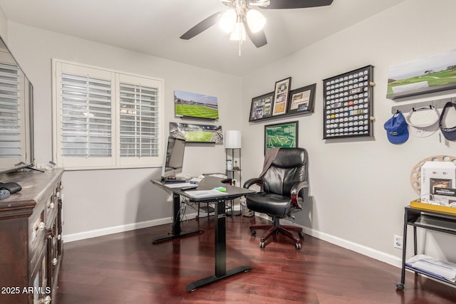 office space featuring a ceiling fan, wood finished floors, and baseboards