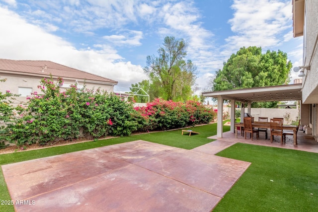 view of patio / terrace featuring fence