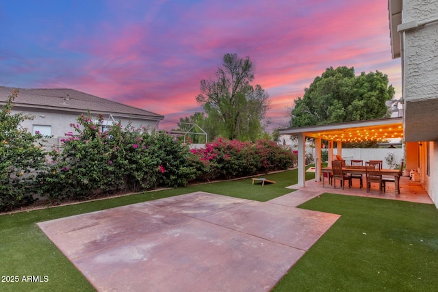 view of yard featuring a patio area and fence