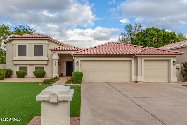 mediterranean / spanish-style house with a front yard, an attached garage, driveway, and stucco siding