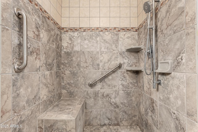 details with a tile shower