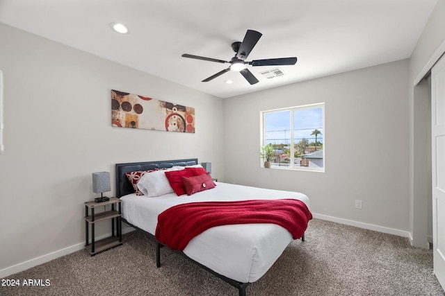 carpeted bedroom with ceiling fan