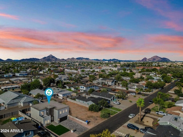 aerial view at dusk with a mountain view