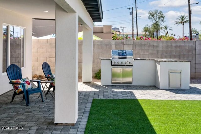 view of patio with area for grilling