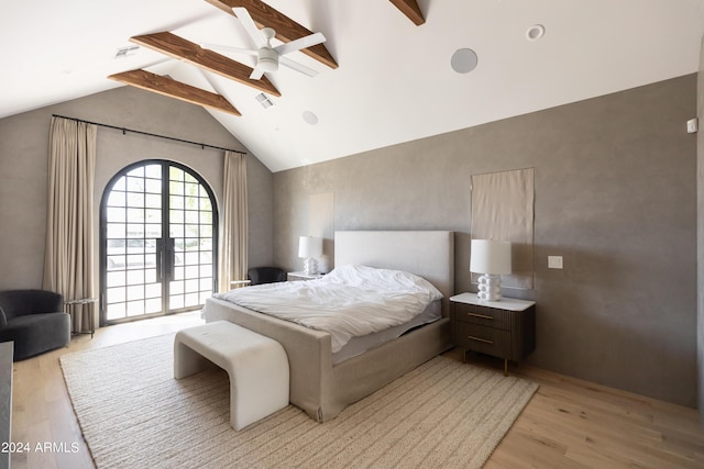 bedroom featuring access to exterior, ceiling fan, beamed ceiling, and light wood-type flooring