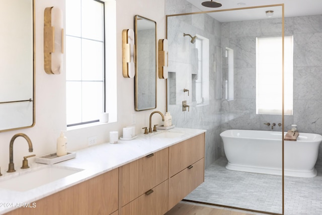 bathroom featuring hardwood / wood-style floors, vanity, and independent shower and bath