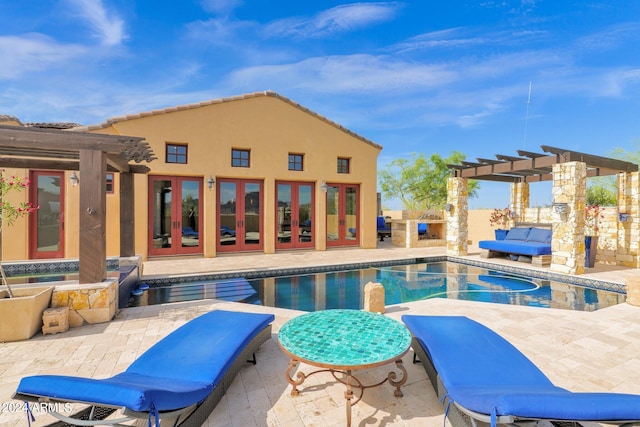 view of swimming pool with french doors, a pergola, a hot tub, and a patio