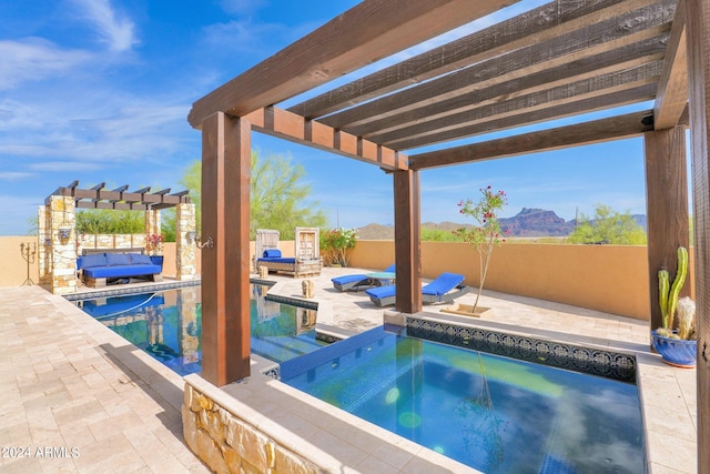 view of pool with a mountain view, a pergola, and a patio area