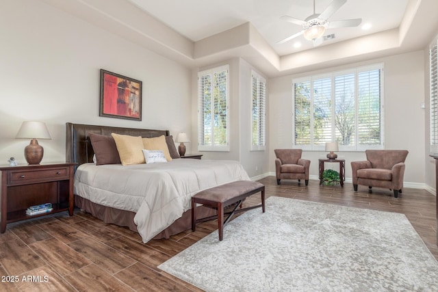 3205 S Ponderosa Dr, Gold Canyon, AZ 85118 - bedroom featuring visible vents, a tray ceiling, baseboards, and dark wood finished floors