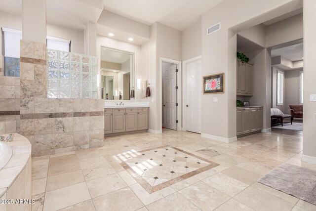 3205 S Ponderosa Dr, Gold Canyon, AZ 85118 - bathroom with visible vents, a bath, baseboards, recessed lighting, and vanity