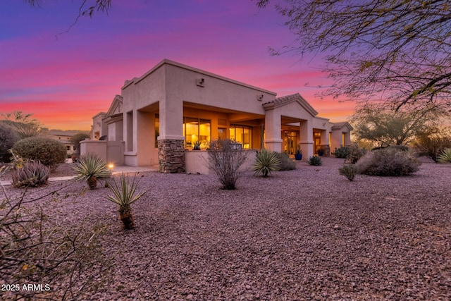 3205 S Ponderosa Dr, Gold Canyon, AZ 85118 - view of front facade featuring a tiled roof, stucco siding, and stone siding
