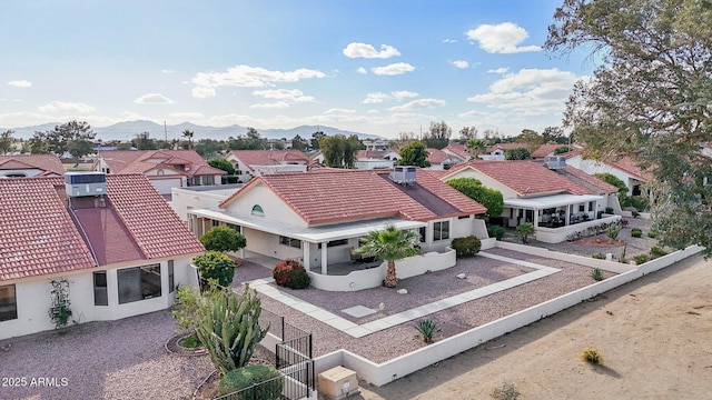 aerial view featuring a residential view and a mountain view