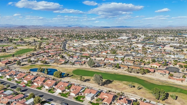 birds eye view of property with a residential view, view of golf course, and a mountain view