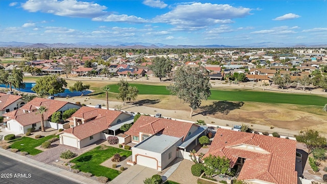 drone / aerial view featuring a residential view and view of golf course