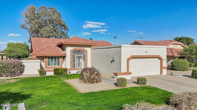 mediterranean / spanish house with a garage, a tile roof, driveway, and stucco siding