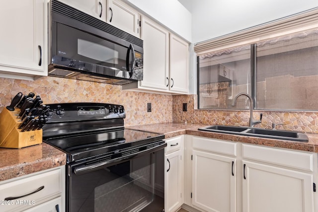 kitchen with white cabinetry, sink, decorative backsplash, and black appliances