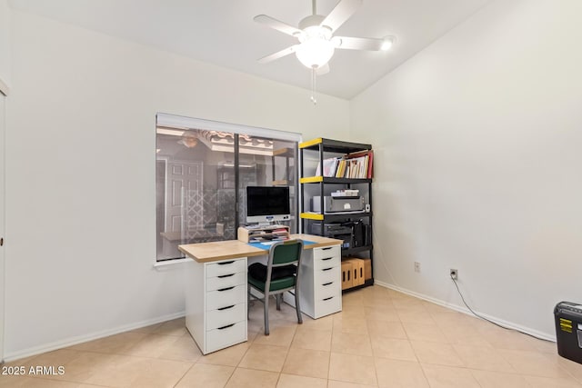 home office with ceiling fan and light tile patterned flooring