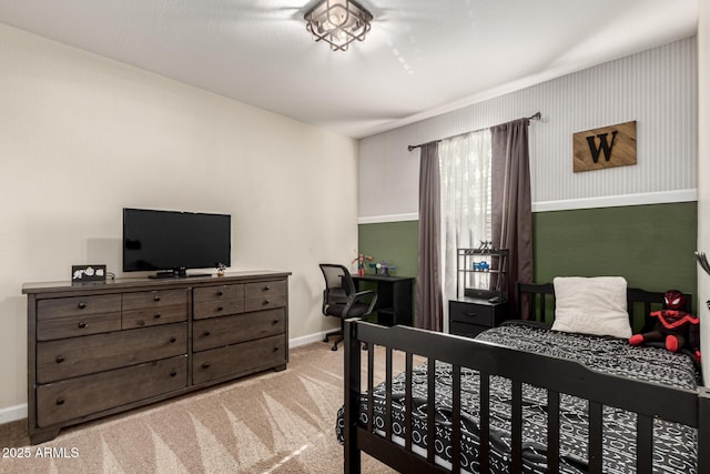 bedroom with light colored carpet