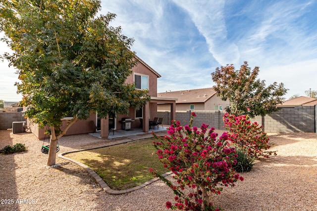 back of property featuring a patio area and central AC unit