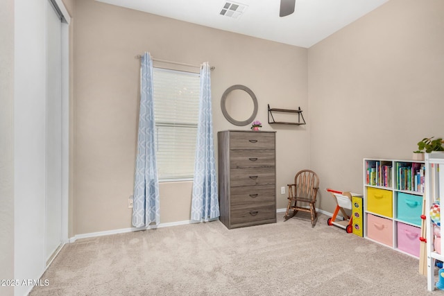 game room featuring carpet floors, ceiling fan, visible vents, and baseboards