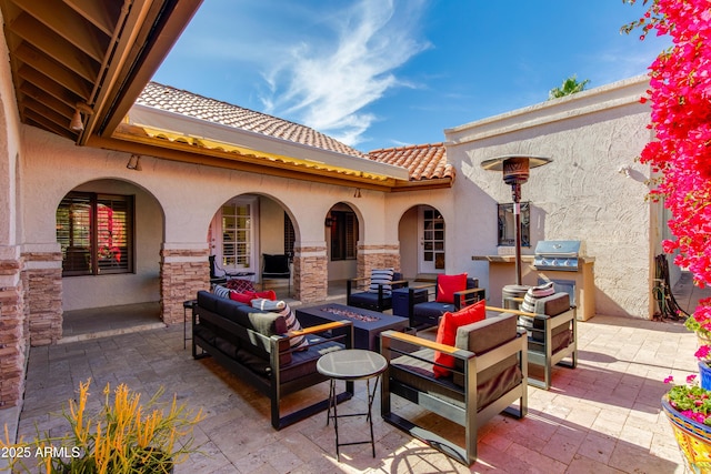 view of patio / terrace featuring grilling area and outdoor lounge area
