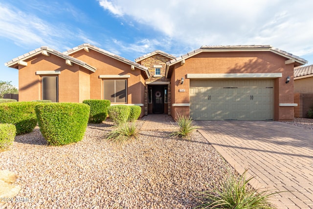 view of front of property featuring a garage