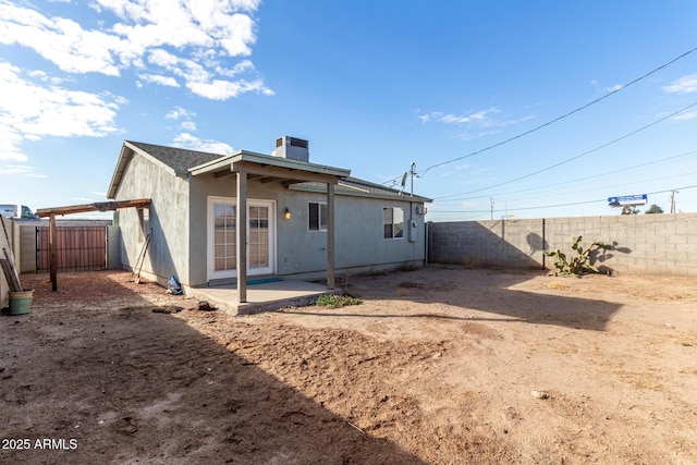 rear view of property with a patio